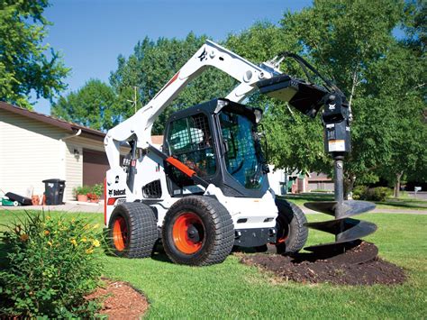 how to move trees with a skid steer|bobcat skid steer attachment.